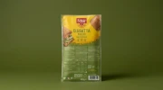 Bezglutenowa Ciabatta Rustica na zakwasie 200g Schar — opakowanie na tle w kolorze produktu