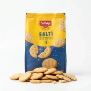Saltì, słone krakersy z solą morską 175g Schar — opakowanie z wysypaną zawartością