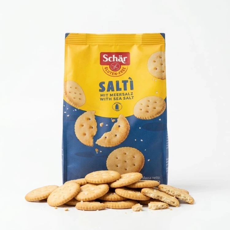 Saltì, słone krakersy z solą morską 175g Schar — opakowanie z wysypaną zawartością