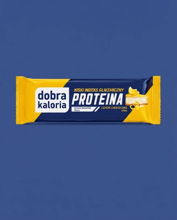 Baton proteina lemon cheesecake niski indeks glikemiczny  45g Dobra Kaloria — opakowanie na tle w kolorze produktu