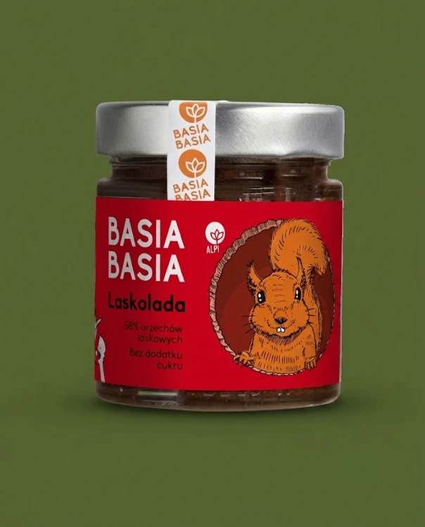 Krem orzech laskowy Laskolada Basia Basia 210g — opakowanie na tle w kolorze produktu