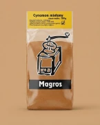 Cynamon mielony 100g Magros — opakowanie na tle w kolorze produktu