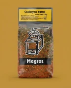 Czubryca ostra 75g Magros — opakowanie na tle w kolorze produktu