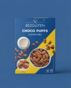CHOCO PUFFS 250g BEZGLUTEN — opakowanie na tle w kolorze produktu