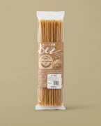 Spaghetti 400g Bartolini — opakowanie na tle w kolorze produktu