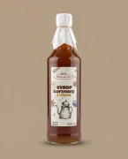 Syrop korzenny z miodem 500 ml Prosto ze Wsi — opakowanie na tle w kolorze produktu