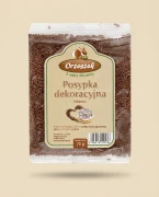 Posypka kakaowa Orzeszek — opakowanie na tle w kolorze produktu