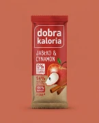 Baton - jabłko & cynamon 35g Dobra Kaloria — opakowanie na tle w kolorze produktu