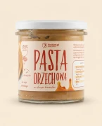 Pasta orzechowa słony karmel 300g Krukam — opakowanie na tle w kolorze produktu