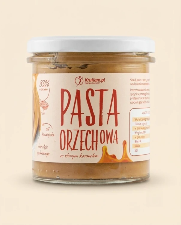 Pasta orzechowa słony karmel 300g Krukam — opakowanie na tle w kolorze produktu