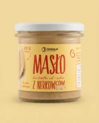 Pasta z nerkowców 300g Krukam — opakowanie na tle w kolorze produktu