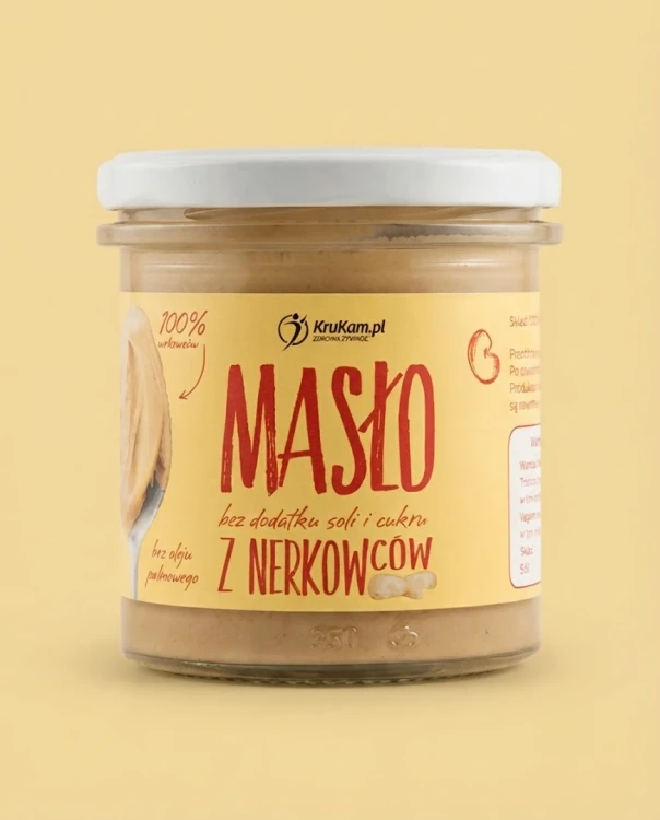 Pasta z nerkowców 300g Krukam — opakowanie na tle w kolorze produktu