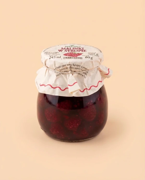 Malinki w syropie 260 g NATURO — opakowanie na tle w kolorze produktu