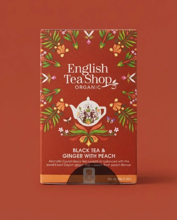 Organiczna herbata czarna z imbirem i brzoskwinią English Tea Shop — opakowanie na tle w kolorze produktu