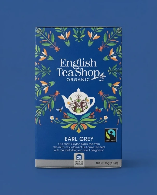 Organiczna herbata czarna z bergamotką English Tea Shop — opakowanie na tle w kolorze produktu