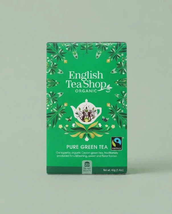 Organiczna herbata zielona cejlońska English Tea Shop — opakowanie na tle w kolorze produktu