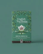 Organiczna zielona herbata Sencha English Tea Shop — opakowanie na tle w kolorze produktu