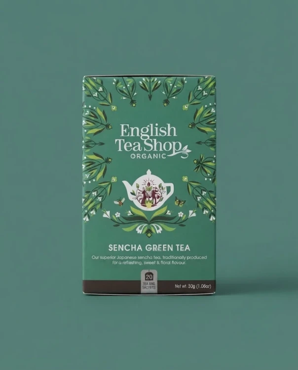 Organiczna zielona herbata Sencha English Tea Shop — opakowanie na tle w kolorze produktu