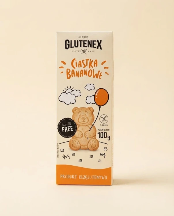 Bezglutenowe ciastka bananowe 100g Glutenex — opakowanie na tle w kolorze produktu