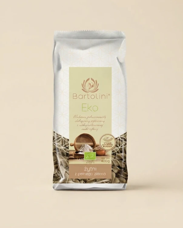 Ekologiczny makaron żytni - świderki 400g Bartolini — opakowanie na tle w kolorze produktu