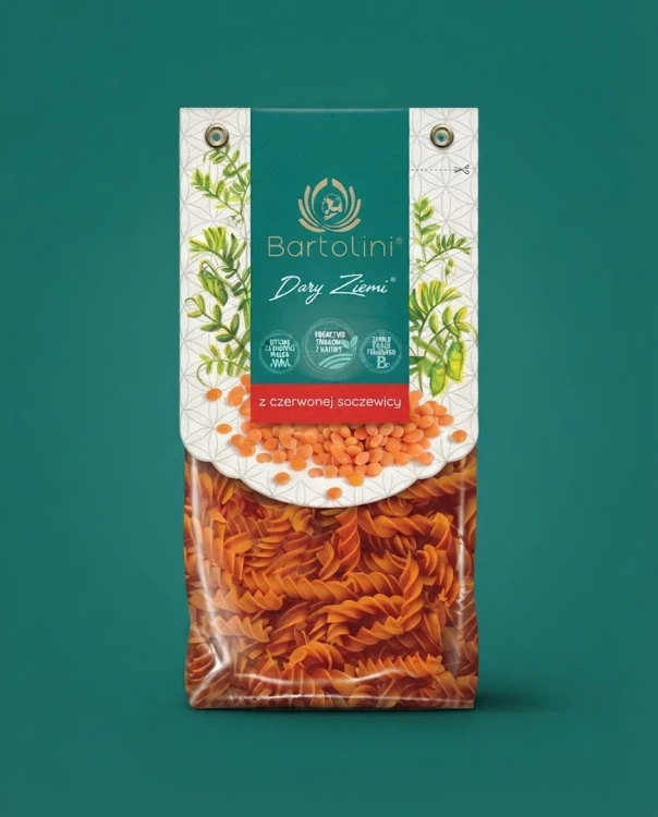 Dary Ziemi Makaron z czerwonej soczewicy - świderki 250g Bartolini — opakowanie na tle w kolorze produktu