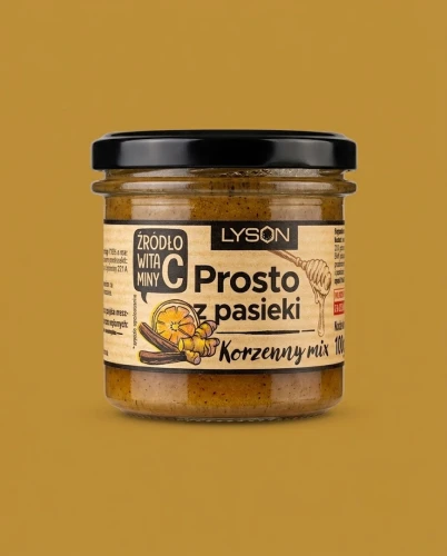 Połączenie miodu z cytrusami, cynamonem, imbirem i acerolą 100 g Łysoń — opakowanie na tle w kolorze produktu